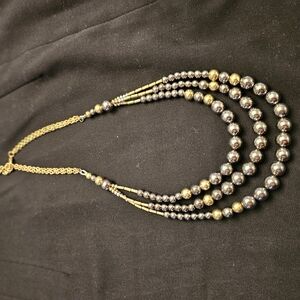 Elegant Gold and Silver Beaded Necklace